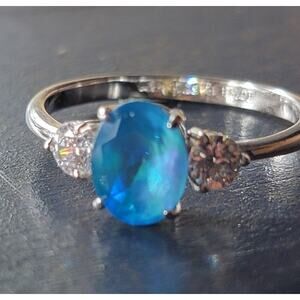 Stunning Rhodium-Plated Size 10.5 Ring with Blue Gemstone and Diamond Accents